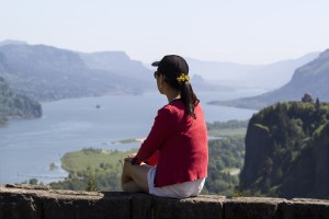 Mature woman viewing the Columbia River Gorge from high above