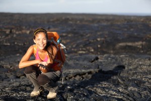 Hiker showing lava on Big Island, Hawaii