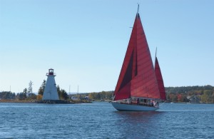 RCI_NovaScotia_Lighthouse_with_Sailboat