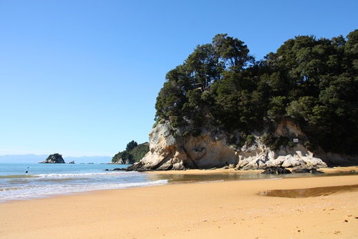Kaiteriteri Beach, Nelson, New Zealand Beautiful Kaiteriteri beach in New Zealand. Incredible orange sand. Gateway to Abel Tasman National Park.
