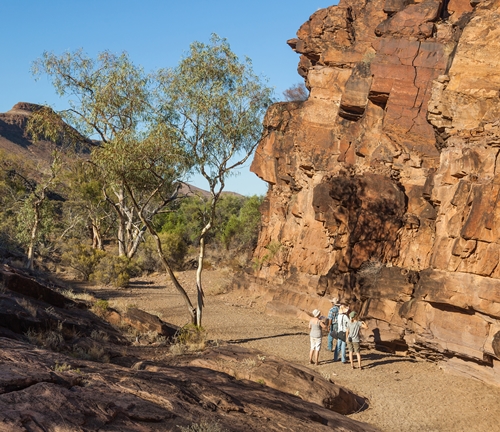 Ku-ring-gai chase National Park, Sydney, Australia, Aboriginal engraving site Tourists at Chambers Gorge aboriginal engraving site. Flinders Ranges. South Australia