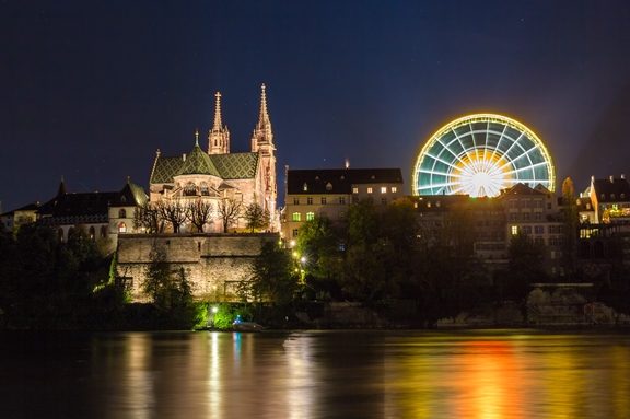 Basel, Switzerland Basel Minster over the Rhine by night - Switzerland