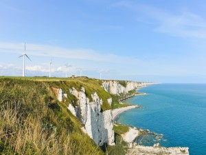 wind turbines on english channel shore in Normandy