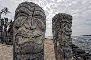 Hawaii Polynesian Tiki wooden statue on the shore
